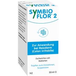 Weiße Medikamentenverpackung für Reizdarm-Tropfen mit blauer Aufschrift.